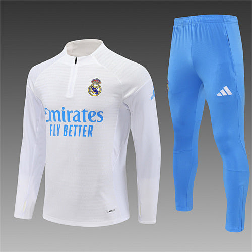 Chándal Real Madrid 25/26 Azul claro – Versión jugador · Detalle en mangas